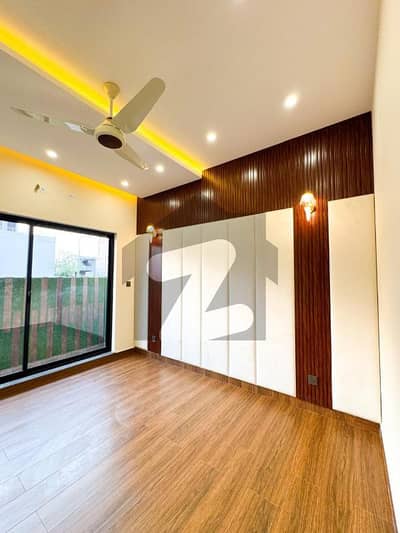Experience High-Class Living in this 5-Marla Designer Bungalow with an Eye-Catching Front, Grand Entrance & Serene Location For Sale in DHA Phase 9-Town, Fresh Listing, Fast Deal