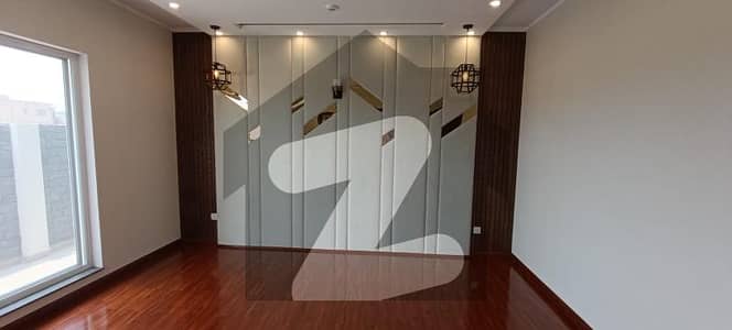 DHA Phase 7 A Marvelous 1 Kanal Brand New House with 5 Spacious Bedrooms, 6 Modern Bathrooms, Double Height Lobby, 3 Designer Kitchens, and Basement Servant Quarters Fresh Listing at Just 8.50 Crore