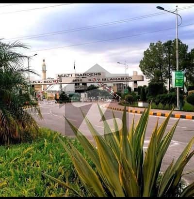 Beautiful prime location Solid land MDR back 1 kanal plot available for sale in Mpchs multi garden B-17 Islamabad