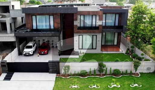 2 YEARS SLIGHTLY USED 2 KANAL ULTRA MODERN MAZHAR DESIGN FULL BASEMENT VILLA WITH SWIMMING POOL FOR SALE NEAR TO RAYA.