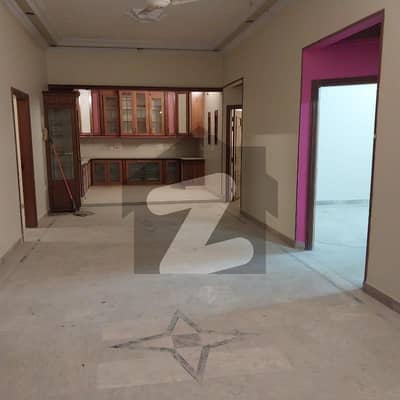 A Stunning 200-Yard House, Situated In The Picturesque Locale Of Gulshan-E-Iqbal Block 4, Is Currently Up For Sale