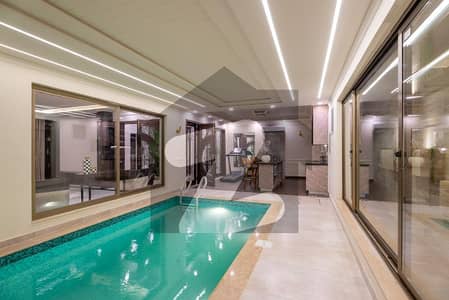 INDOOR SWIMMING POOL 1 KANAL FULLY FURNISHED FAISAL RASOOL SPANISH DESIGN BANGALOW FOR SALE NEAR TO CARREFOUR.
