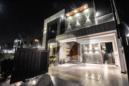 Modern Lifestyle in DHA Phase 7 10-Marla Stylish Slightly Used House Featuring Sun-Filled Rooms, Spacious Designer Kitchen with Imported Fittings, Solid Grade-A Construction, and Panoramic Lawn Views for a Peaceful Family Living.