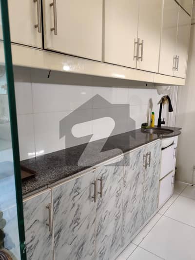 Dha 10 Marla House Available With Tiled flooring For Rent