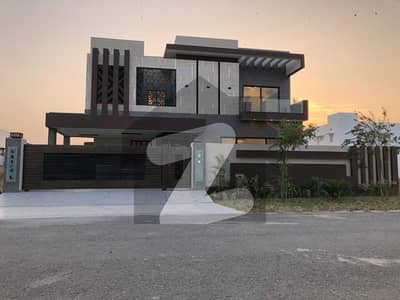 1 Kanal Luxury Bungalow in DHA Phase 6 with Full Basement, 6 Beds, 70 Feet Road, Near Raya