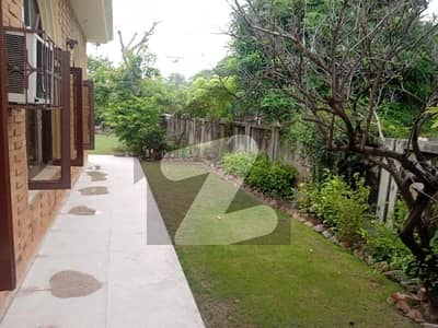 DHA Ph 1 Corner Lower Locked S/Gate one Kanal Upper Portion with One kanal Lawn