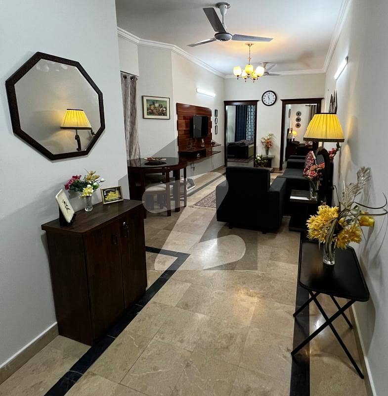 Beautiful fully furnished apartments 2 bed room attach washroom d d TV launch kitchen underground car parking Beautiful fully furnished apartments 2 bed room attach washroom d d TV launch kitchen underground car parking