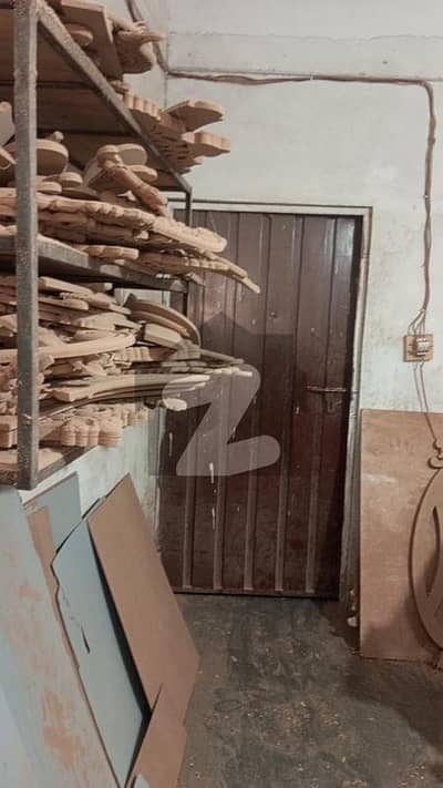 8.5 Marla Commercial Building With Basement For Sale on Main Katarband Road Lahore