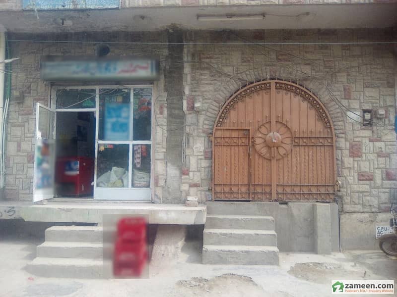 Facing Canal Double Storey Commercial House for Sale