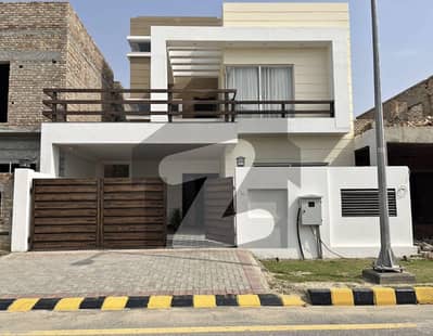 12 Marla Newly Constructed Semi Furnished Villa Available For Rent In Villa Community Near Banks Market Masjid Curtains And AC Are Installed In Villa