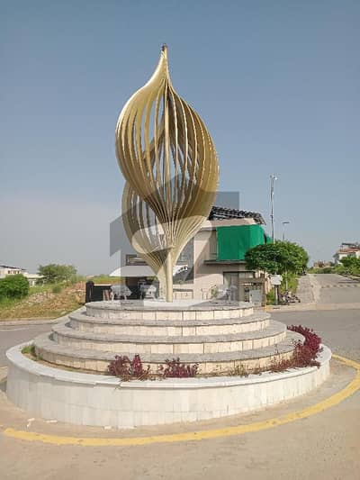 Top Height Street 23 of Sector C one Kanal level Plot for urgent sale