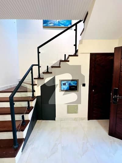 125sq yd Luxury Villa in Ali Block. 3/4Bedrooms, Drawing, Dining & American Kitchen. 5mins drive from main gate of BTK.