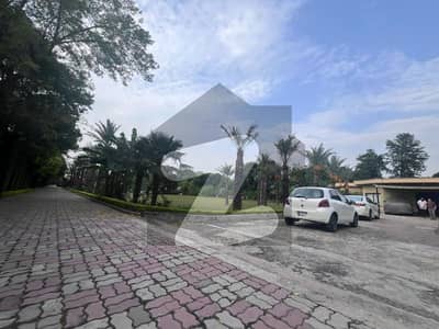 10 Kanal Luxury Farmhouse for Rent in Orchard Scheme, Islamabad | 2 Spacious Bedrooms, 3 Luxury Bathrooms with Gold-Plated Sanitary Fittings, Swimming Pool & Tennis Court | Monthly Rent: USD 4,000 (Negotiable)