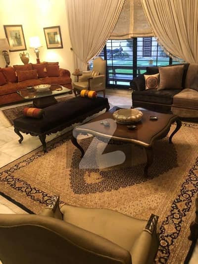 Prime Location DHA Phase 6 House For Sale Sized 900 Square Yards