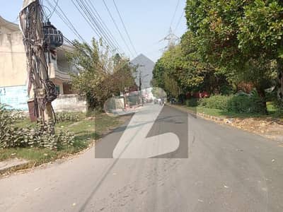 1 Kanal Plot Facing Green Belt Very Near To Wahdat Road.