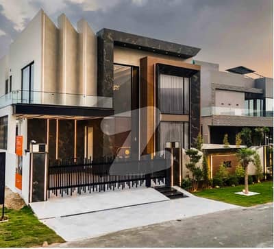 Brand New 1-Kanal Masterfully Designed Bungalow In DHA Phase 7 Block Q With 5 Ensuite Bedrooms, Designer Finishes, Wide Green Lawn, Modern Kitchen, Servant Quarter & Direct Access To The 150 Ft Road Perfect Home, Perfect Location