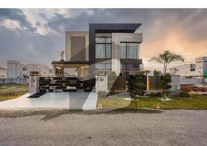 Brand New 1-Kanal Masterfully Designed Bungalow In DHA Phase 7 Block T With 5 Ensuite Bedrooms, Designer Finishes, Wide Green Lawn, Modern Kitchen, Servant Quarter & Direct Access To The 150 Ft Road Perfect Home, Perfect Location