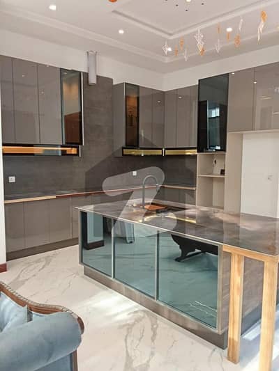 10 Marla Elegant And Fully Maintained Super Hot Located Bungalow Is Available In The Best Block Of DHA Lahore.