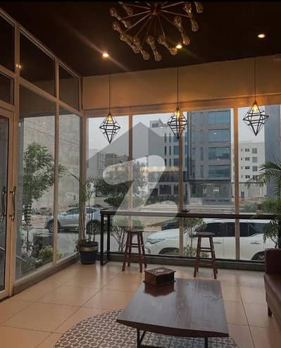 100 yds GROUND BESMENT 4 FLOORS  RENTED OUT. IN DHA PHASE 8 KARACHI.