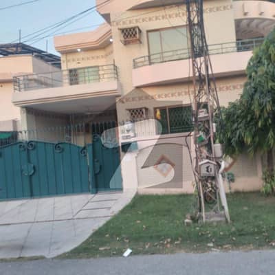 A Smart Choice in Defence Spacious 14 Marla Fully Furnished Luxury House Built with Quality Construction, Separate Gate, Lush Lawn & Peaceful Surroundings by Emarat Real Estate