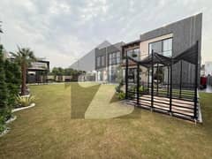 2 KANAL FULL BASEMENT FURNISHED BUNGALOW KANAL LAWN SUPER LUXURY NEAR RAYA TOP LOCATION
