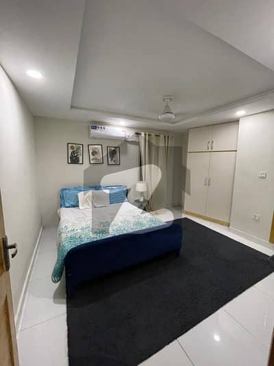 E-11 Two Bedroom Fully Furnished Apartment Available For Rent