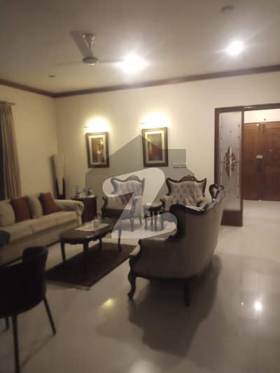 500 YARDS GROUND FLOOR 3 BEDROOMS WITH HALF BASEMENT PORTION FOR RENT