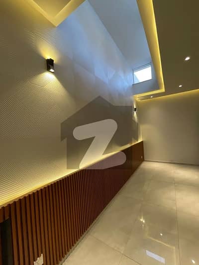 10 Marla Brand New Designer House Available For Sale  just 1 Mnt Drive From the Main Gate!!