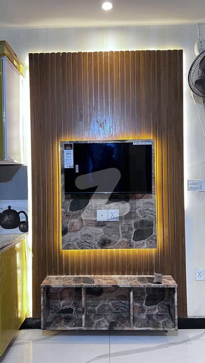 Brand New 2 Bed Full Furnished Flate For Sale 80K Rental Value All Electronics Available Brand New Plaza CDA Approved Security Cameras Lift 24/7 Water 24/7 Sollar Backup Biomatric Lock System