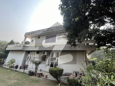 Facing Park-Two side open-40 Marla Used House For Sale In Garden Town Lahore 8 Rooms, 100 Feet Front, Ideal For Both Residential And Commercial Use