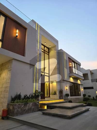 ULTRA-MODERN 1000-YARD BUNGALOW | DHA PHASE 8, KARACHI ULTRA-MODERN 1000-YARD BUNGALOW | DHA PHASE 8, KARACHI