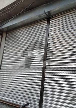Double Shutter Shop For Sale in PIB Colony Near Main Road, Best For Rental Income And Investment