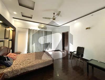 1 Kanal Slightly Used Modern Design House For Rent In DHA Phase 5 Block-B Lahore.