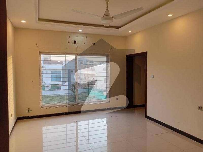 E-11: 10-Marla Triple Story House With Beautiful Lawn