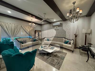 One Kanal Slightly Used Ultra Modern Design Well Maintained Owner Build Full Basement Bungalow For Sale At Prime Location Of DHA Lahore Near To Park Masjid & Commercial Market