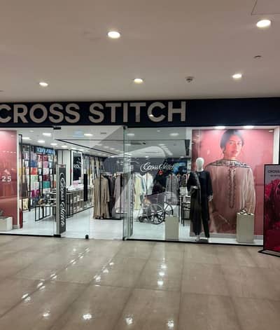 SHOP FOR SALE ON INVESTOR RATE IN F-8 MARKAZ RUNNING ON RENT