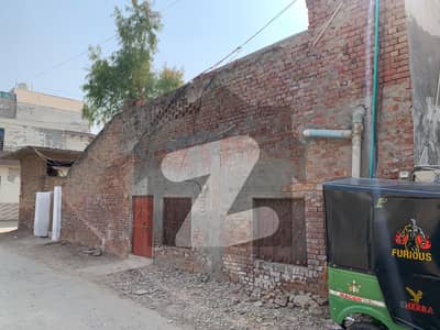 15 Marla Commercial/Residential Plot on Sale On Ideal location - Green Town .