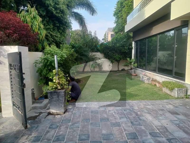 Modern 1-Kanal Architectural Masterpiece In DHA Phase 1 Modern 1-Kanal Architectural Masterpiece In DHA Phase 1