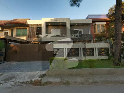 New Modern, Double-Storey House on 70ft Road, near G11 Markaz , Double Road Back , with 2 parks , Servant quarter. CDA Transfer
