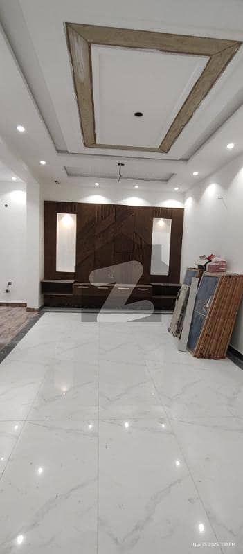 6 MARLA BRAND NEW TRIPLE STORY 5 BEDS DOUBLE KITCHEN HOUSE 10 MINUTES DISTENCE FROM UCP AND SHOUKAT KHANUM