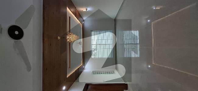 14 Marla Brand New Luxury 3 Side Open House. 7 Bedrooms With Attach/ 8 Bathrooms/2 Dining. Room TV Launch 2/ Electric City Water Gas /2kitchens TV Lounge/ One Servant Room Separate Entrance /2 Car Parking Mini Long All Facilities In Life Available Serious Party Contact Please