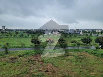 DHA Phase 7 20 Marla Plot for Sale 580 Y Prime location plot available in DHA Phase 7, ideal for dream home or solid investment. Fully developed area with wide roads, peaceful surroundings, and high growth potential. Dont miss this golden opportunity!