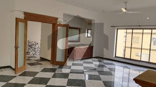 A Very Well Maintained House With Beautiful Huge Lawn Available For Rent