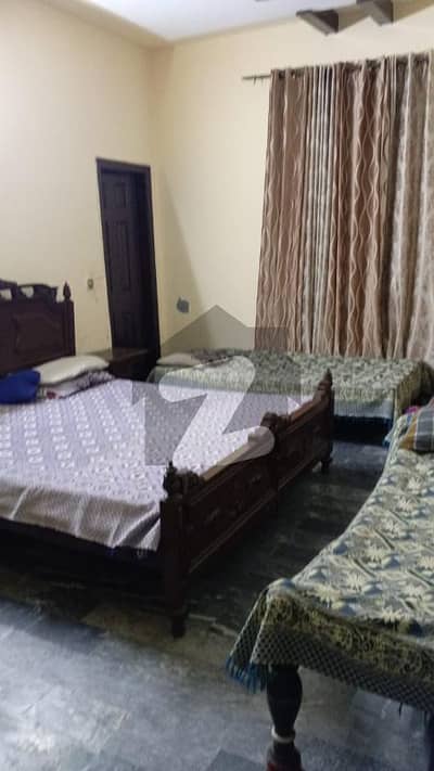 2 Kanal Double Storey House Facing Park On 80 Feet Rode Available For Sale In Model Town, Lahore.