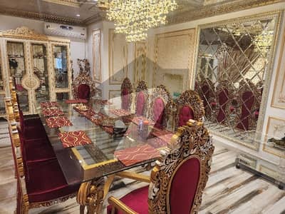 2 kanal 4 marla house = 44 marlas brand new Spanish Furnished house for sale in prime location Wapda town Near Al fatah, Jalal sons and Euro store  7 Bedrooms with attached washrooms 2 Big TV lounges 2 Kitchens 2 Terraces 2 Store rooms Dining room with powder washroom Drawing room Snooker room A Big Gym Swimming Pool And 2 servant quarters with attached washrooms