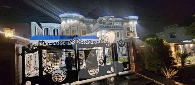 Headline: ULTRA-LUXURY 2 KANAL MANSION: Cinema Hall & Prime 100 Ft Road Location in NFC/Valencia Environs  Ad Copy An unparalleled opportunity to acquire an executive residence designed for grandeur and modern comfort.  We proudly present a magnificent 2 Kanal (40 Marla) Luxury House located