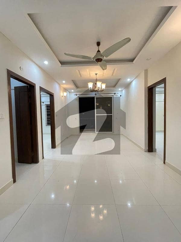 E11 Two bedrooms unfurnished apartment available for sale