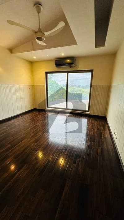 Defence Raya Luxury Living at Its Best Spacious 2-Kanal Golf-Facing Bungalow Featuring 7 Master Suites, 2 Elegant TV Lounges, Drawing/Dining & Servant Quarters Defence Raya Luxury Living at Its Best Spacious 2-Kanal Golf-Facing Bungalow Featuring 7 Master Suites, 2 Elegant TV Lounges, Drawing/Dining & Servant Quarters