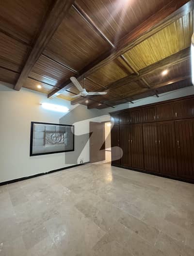 F-10 Top Location 666 SQ YARD Excellent Modern And Spacious House 6 Bedrooms All New Bathrooms and New Kitchen Tiled Flooring Double kitchen Beautiful Green Lawn 8 Cars parking Space Top Location