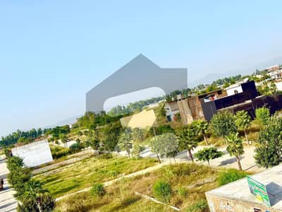 6.33 Marla Commercial Plot For Sale On Prime 50 Foot Road VIP BLOCK Zamar Valley Islamabad.